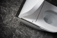 Load image into Gallery viewer, TOTO NEOREST® LS Dual Flush Toilet - 1.0 GPF & 0.8 GPF - MS8732CUMFG - top view installed with trim detail
