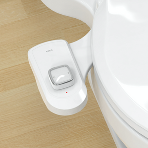 VOVO VM-001D Non-electric Bidet Attachment, Metal Coated Dual Nozzle System installed top view with wooden floor background